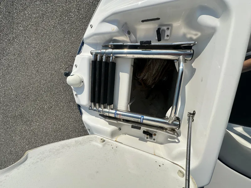 Slide: The Image of Yamaha 212X 2012 boat ladder and storage compartment on deck. - 18