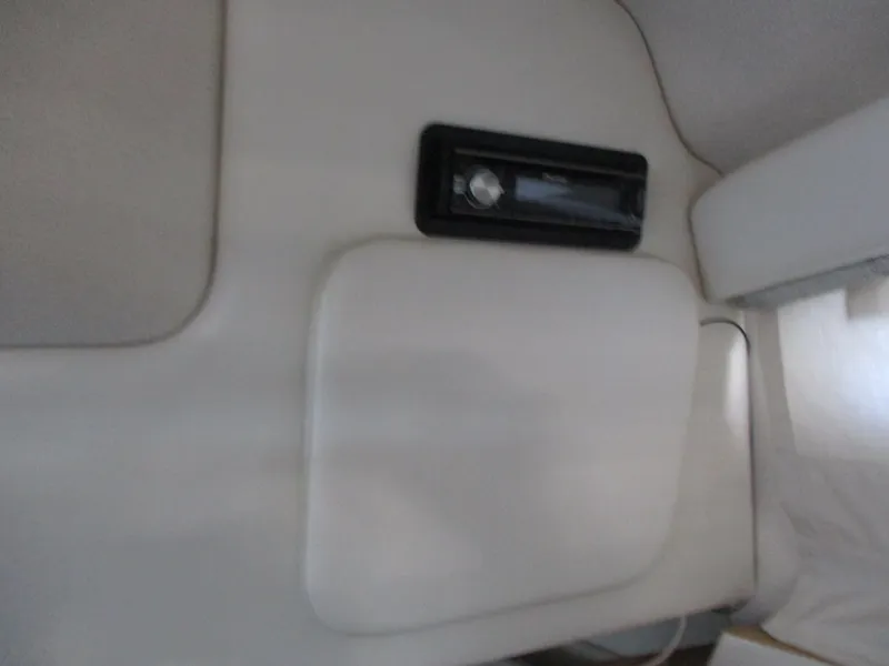 Slide: The Image of Interior detail of 1998 Bayliner 2855 Ciera Sunbridge boat, featuring a control panel. - 26