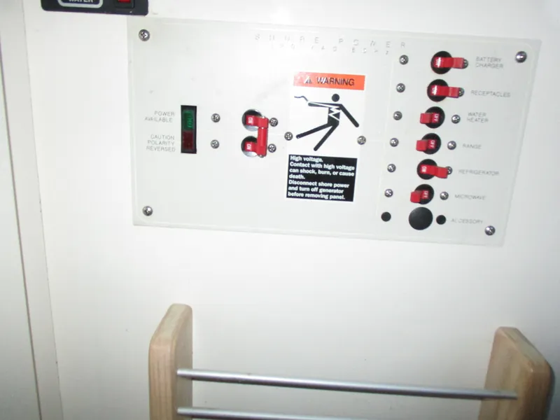 Slide: The Image of Electrical control panel on a 1998 Bayliner 2855 Ciera Sunbridge boat. - 30