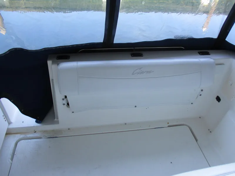 Slide: The Image of 1998 Bayliner 2855 Ciera Sunbridge interior seating with water view. - 7
