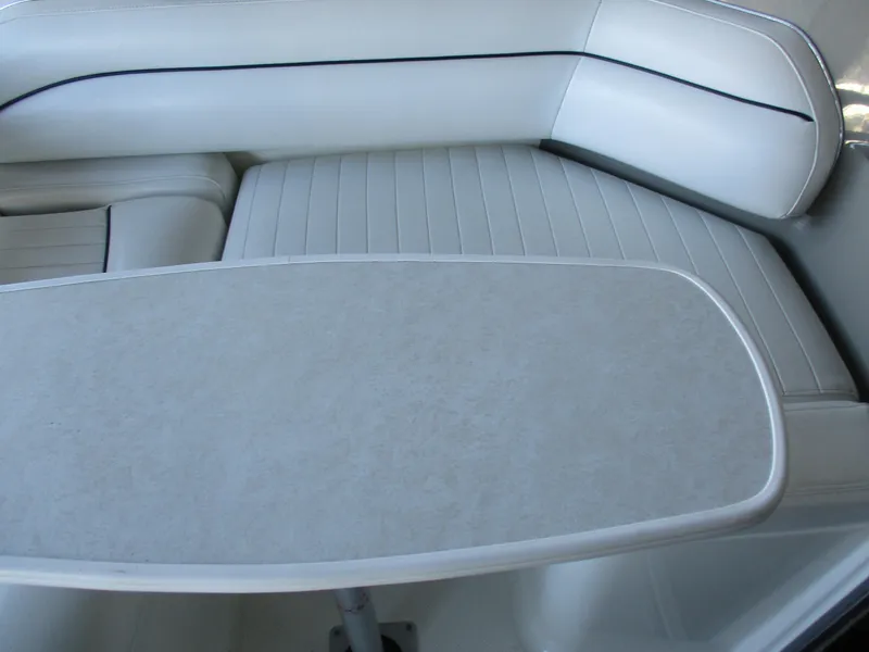 Slide: The Image of Interior seating and table of 1998 Bayliner 2855 Ciera Sunbridge boat. - 8