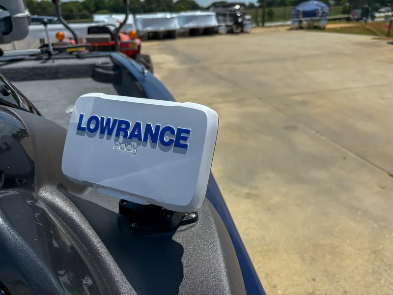 Slide: The Image of Lowrance Hook device on 2019 Tracker Pro Team 175 TF boat, outdoor setting. - 14
