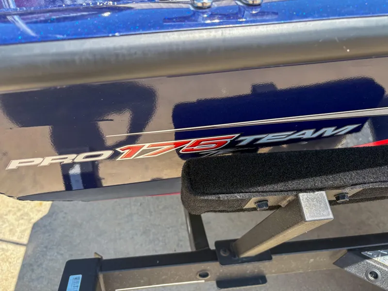 Slide: The Image of 2019 Tracker Pro Team 175 TF boat detail with logo and trailer. - 15