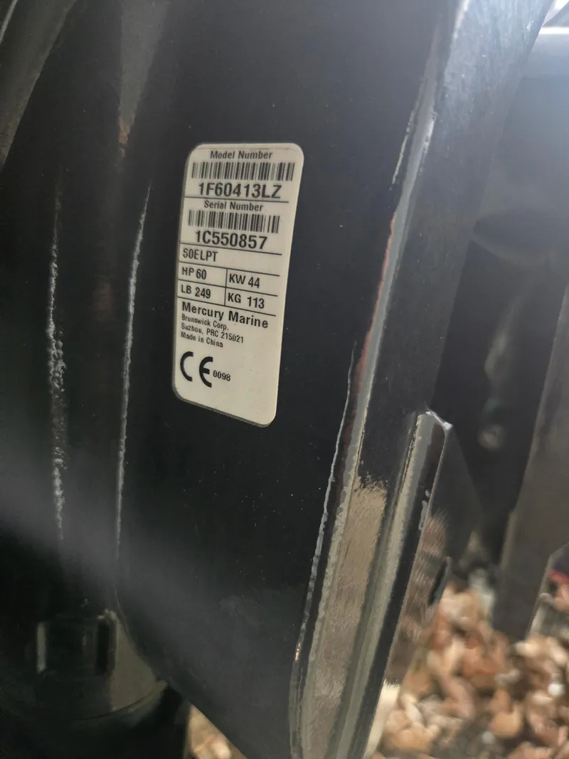 Slide: The Image of Label on 2019 Tracker Pro Team 175 TF boat engine, showing model and serial numbers. - 3