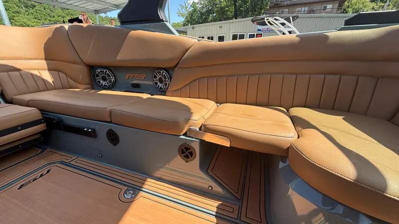 Slide: The Image of Luxurious interior of 2025 MB B52 25 Alpha boat with tan leather seating. - 17