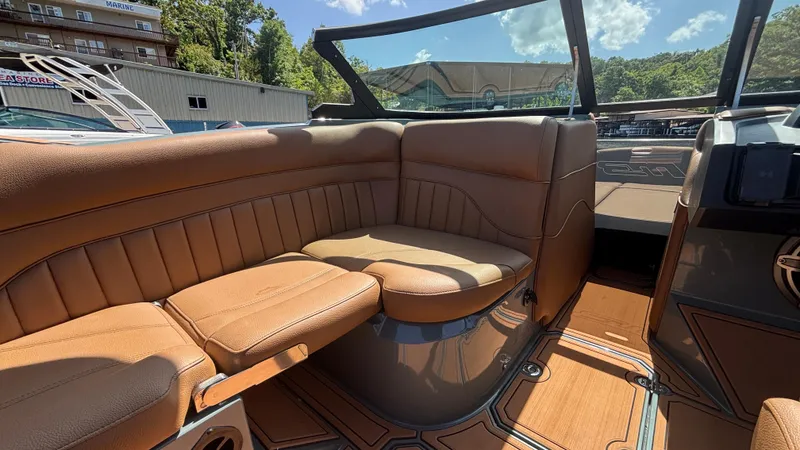 Slide: The Image of Luxurious interior of 2025 MB B52 25 Alpha boat with tan leather seating. - 21