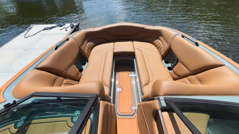 Slide: The Image of Luxurious interior of 2025 MB B52 25 Alpha boat with tan leather seating. - 34