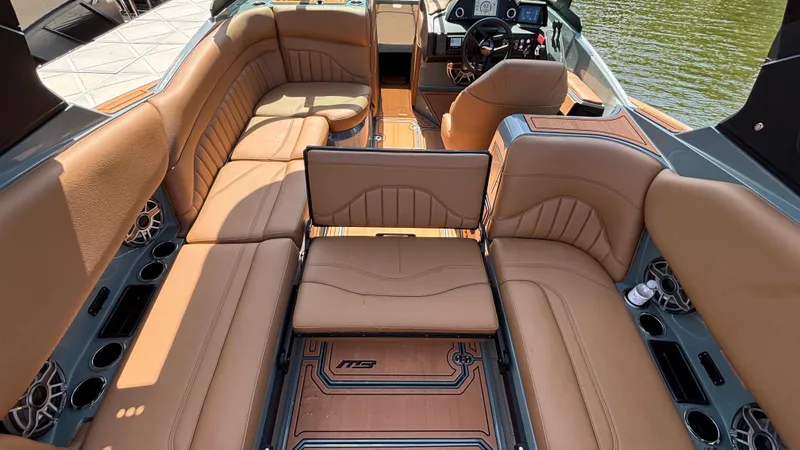 Slide: The Image of Luxurious interior of 2025 MB B52 25 Alpha boat with tan leather seating. - 43