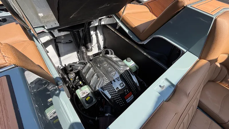 Slide: The Image of 2025 MB B52 25 Alpha engine compartment with tan leather interior and sleek design. - 46