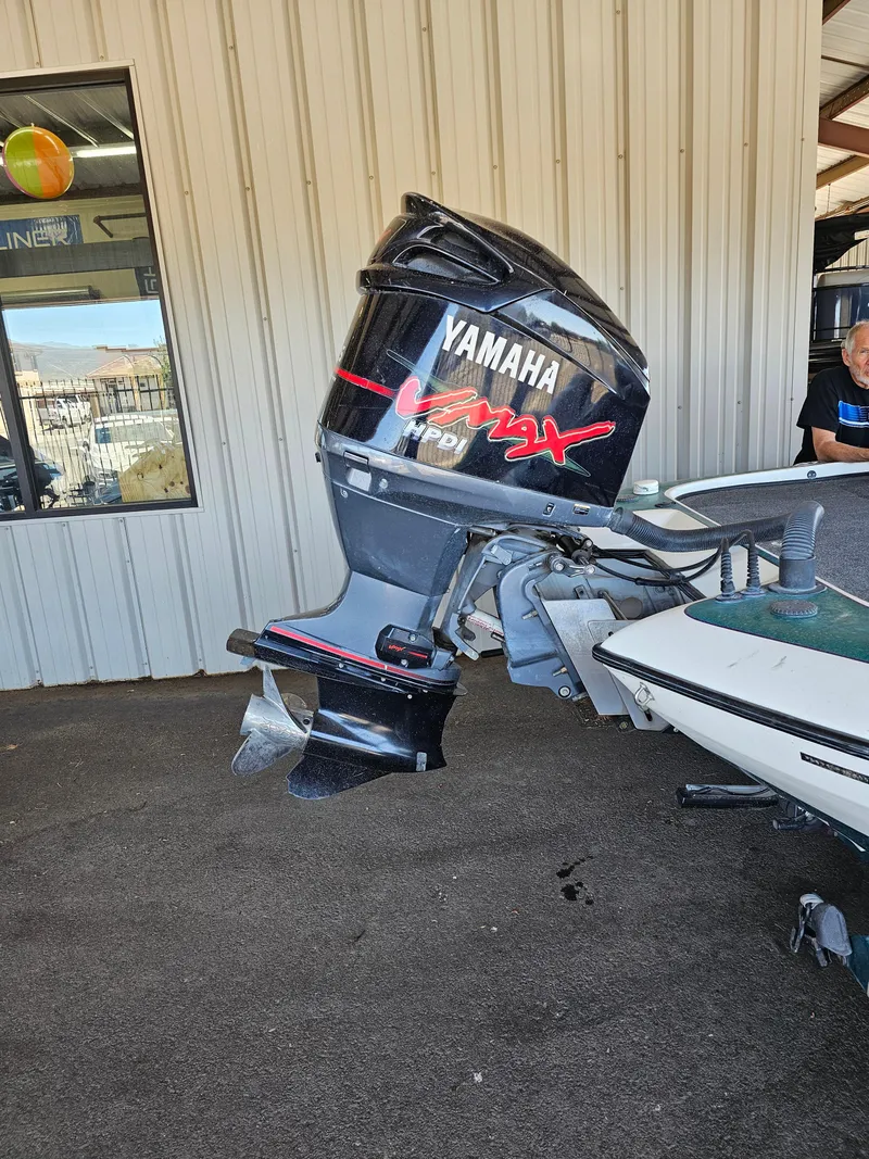 Slide: The Image of 2005 Blazer 202 Pro-V boat with Yamaha VMAX outboard motor in a garage setting. - 4