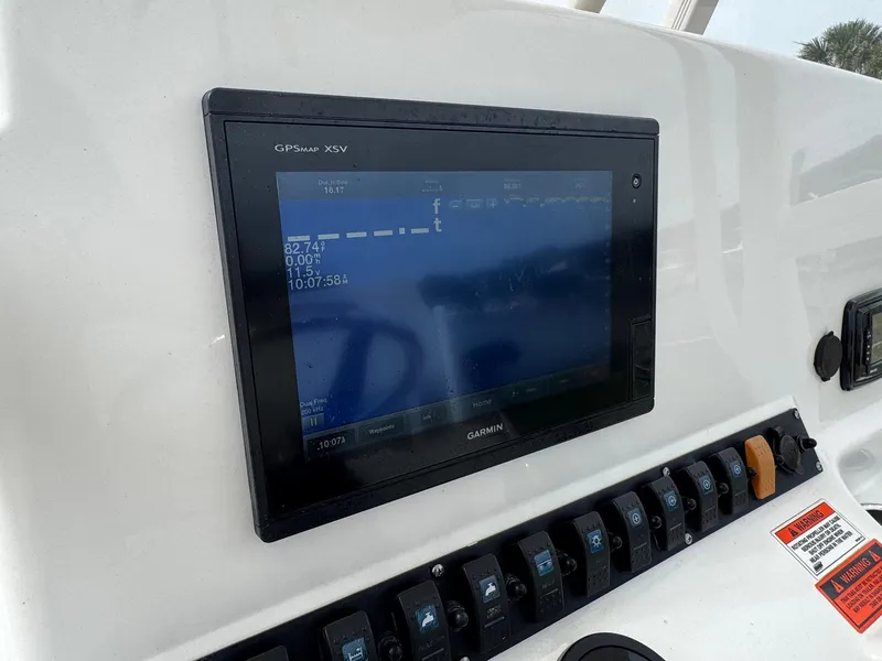 Slide: The Image of Garmin GPS display on 2016 Sea Hunt BX22 boat dashboard. - 13