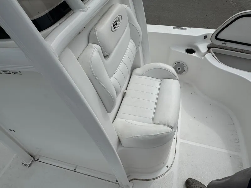 Slide: The Image of White leather seat on 2016 Sea Hunt BX22 boat, featuring sleek design and comfort. - 20