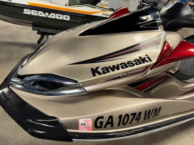 Slide: The Image of 2013 Kawasaki Ultra 300 LX jet ski, beige with red accents, registration GA 1074 WM. - 13