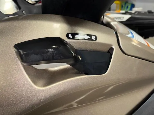 Slide: The Image of 2013 Kawasaki Ultra 300 LX throttle lever, close-up view. - 14