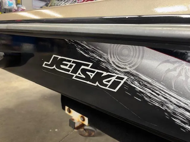 Slide: The Image of 2013 Kawasaki Ultra 300 LX Jet Ski with sleek black and white design. - 17