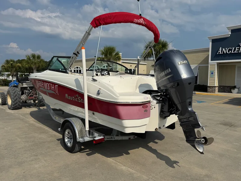 Slide: The Image of 2017 NauticStar 203 DC boat with Yamaha 150 engine on trailer. - 5