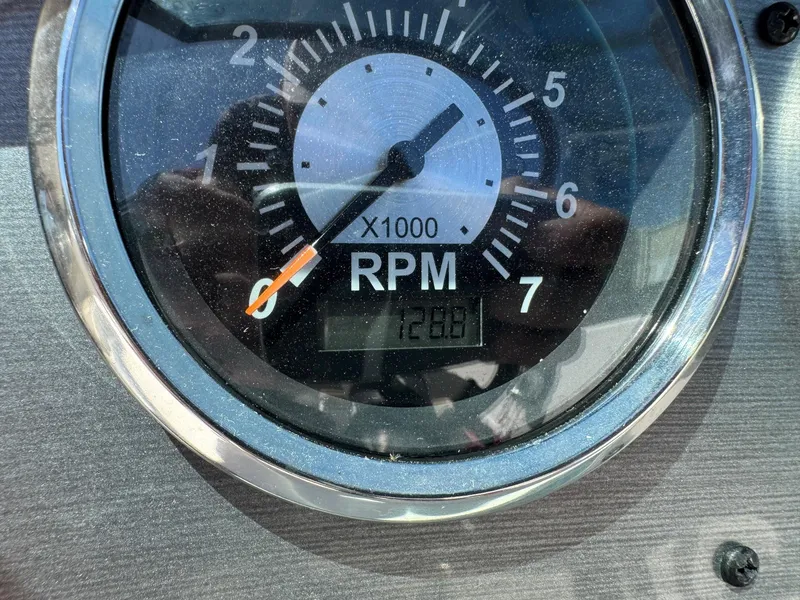 Slide: The Image of Close-up of 2017 NauticStar 203 DC tachometer showing 1288 RPM. - 7