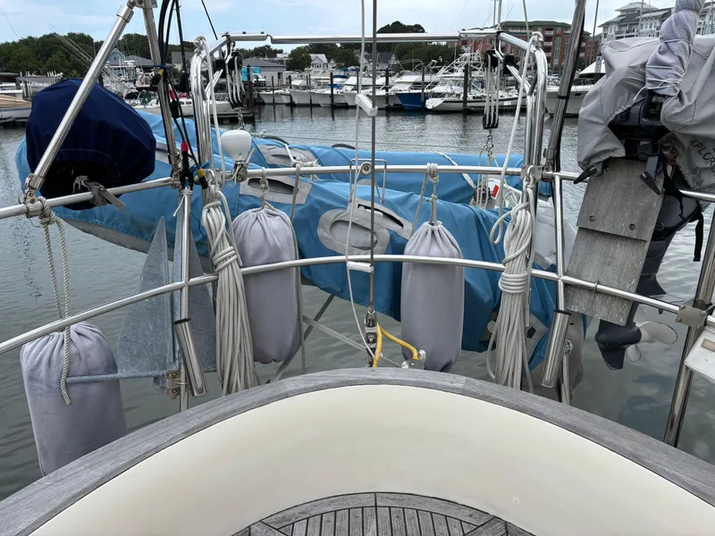Slide: The Image of Sailboat deck view of 1987 Ta Shing Tashiba 36 in marina, with covered equipment. - 17