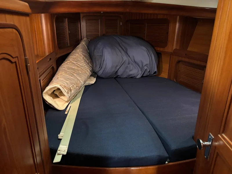 Slide: The Image of Cozy cabin interior of 1987 Ta Shing Tashiba 36 sailboat with wooden finish and bedding. - 40