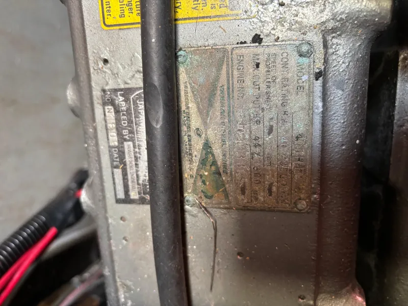 Slide: The Image of Close-up of a 1987 Ta Shing Tashiba 36 engine plate with specifications. - 49