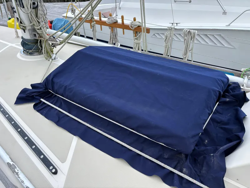 Slide: The Image of Sailboat deck with blue cover, ropes, and mast on 1987 Ta Shing Tashiba 36. - 9