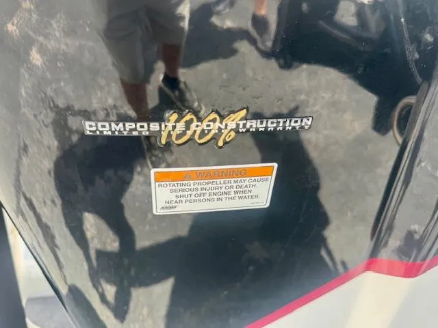 Slide: The Image of 2017 Blazer Bay 2170 boat with composite construction and safety warning label. - 11