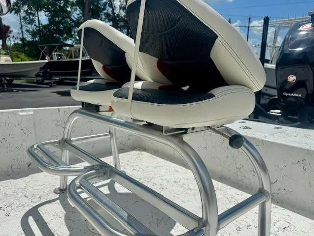 Slide: The Image of 2017 Blazer Bay 2170 boat seats with aluminum frame, outdoor setting. - 20