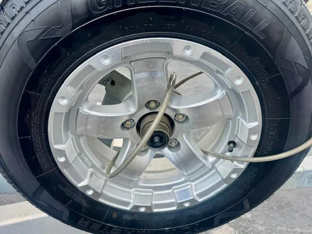 Slide: The Image of 2017 Blazer Bay 2170 wheel with Greenball tire and metal cable lock. - 21