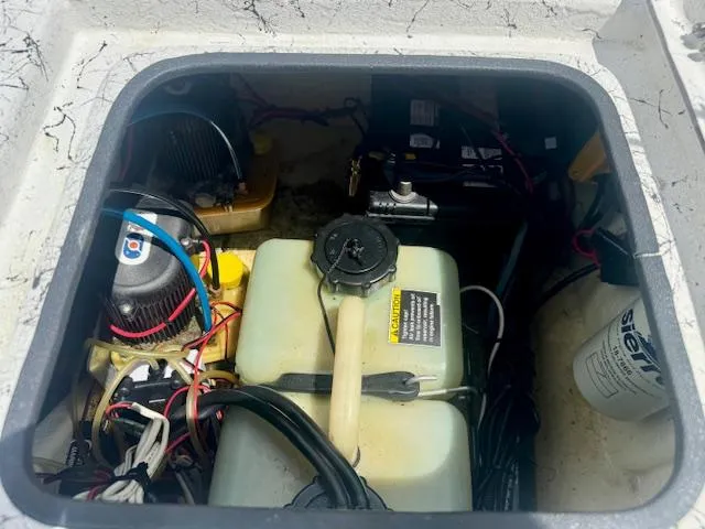 Slide: The Image of Engine compartment of a 2017 Blazer Bay 2170 boat, showing wiring and components. - 25