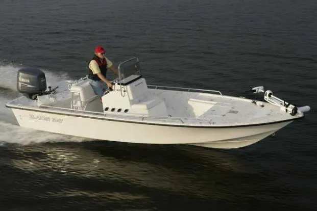 Slide: The Image of Manufacturer Provided Image: 2017 Blazer Bay 2170 boat cruising on water with a person at the helm. - 26