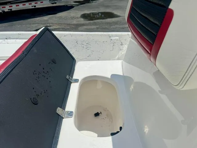 Slide: The Image of 2017 Blazer Bay 2170 boat seat with open storage compartment. - 29