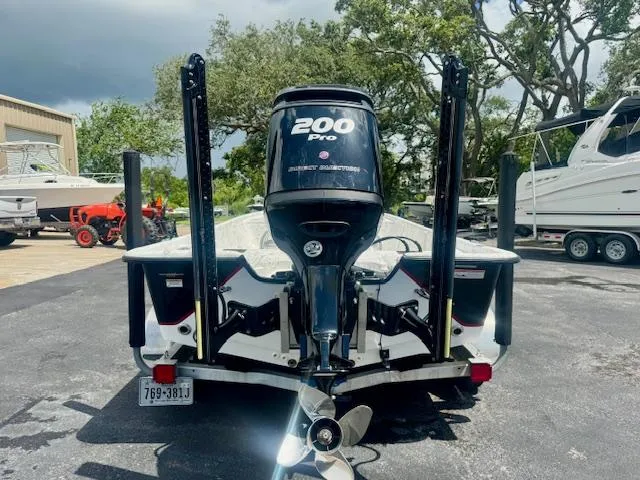 Slide: The Image of 2017 Blazer Bay 2170 boat with 200 Pro engine, parked outdoors. - 3