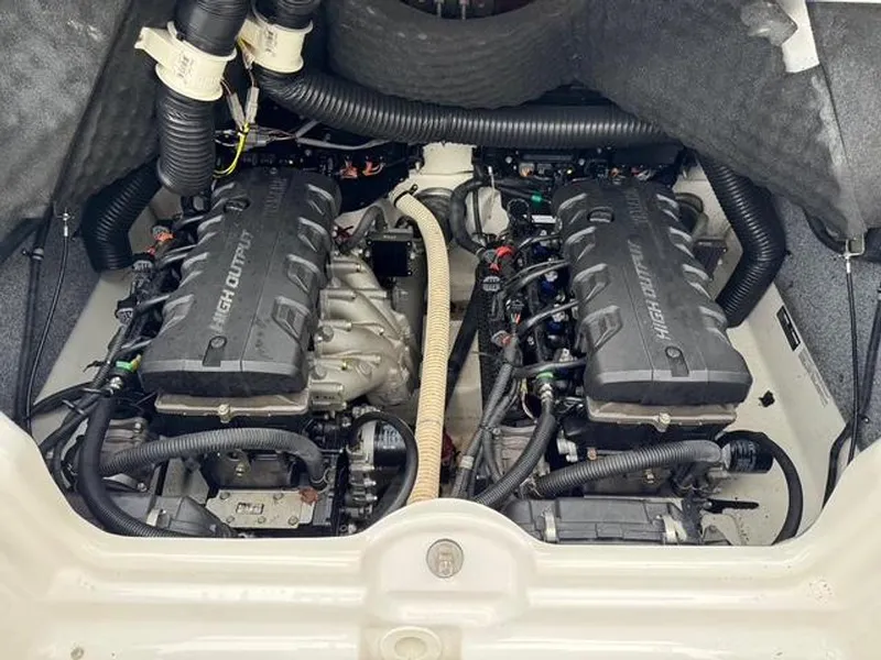 Slide: The Image of Engine compartment of 2016 Yamaha Boats 242 Limited S, featuring dual high-output engines. - 6
