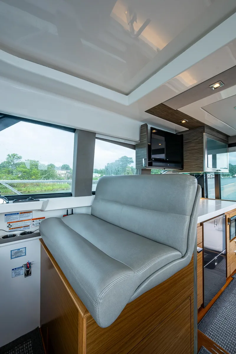 Slide: The Image of 2020 Tiara Yachts C44 Coupe interior with modern seating and sleek design. - 40