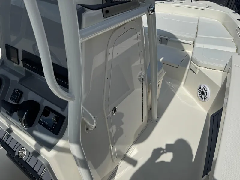 Slide: The Image of 2025 Pathfinder 2400 TRS boat interior with console and seating area. - 25