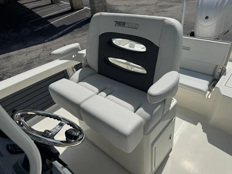 Slide: The Image of 2025 Pathfinder 2400 TRS boat seat with steering wheel, showcasing luxury design. - 35