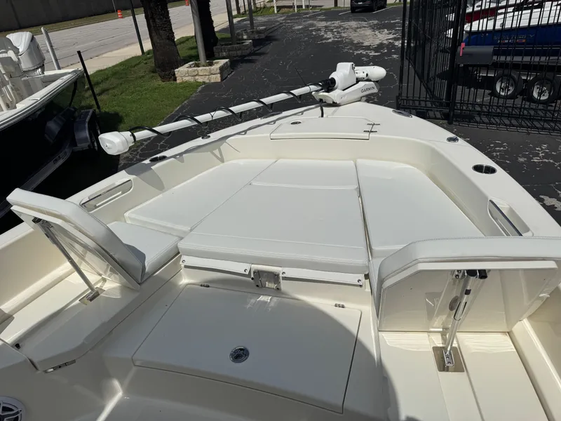 Slide: The Image of 2025 Pathfinder 2400 TRS boat deck with seating and Garmin equipment. - 48