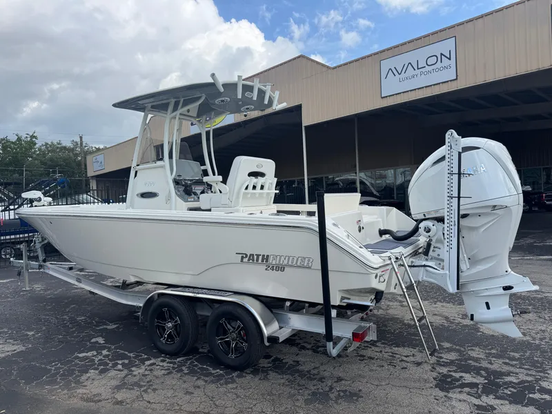 Slide: The Image of 2025 Pathfinder 2400 TRS boat on trailer at Avalon Luxury Pontoons dealership. - 8