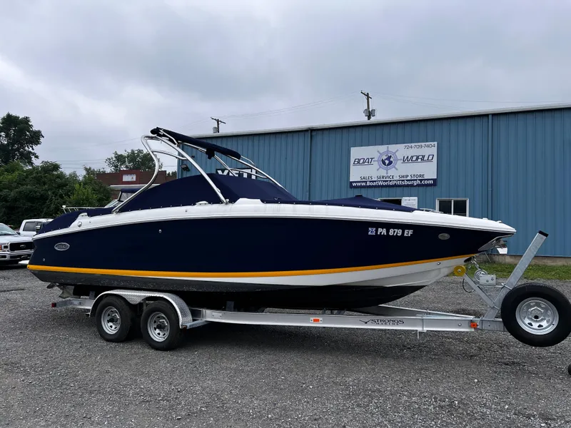 Slide: The Image of 2013 Cobalt 262 boat on trailer outside Boat World dealership. - 2