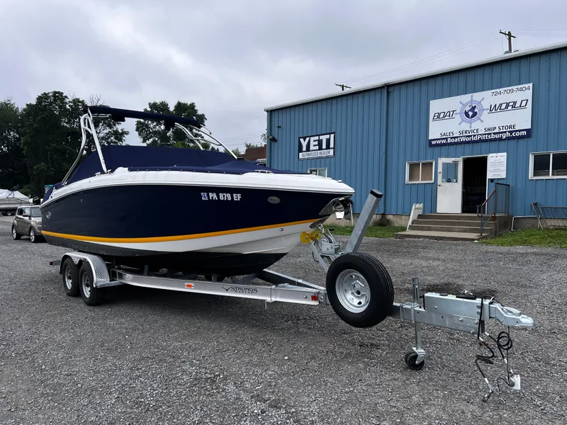 Slide: The Image of 2013 Cobalt 262 boat on trailer outside Boat World dealership. - 3