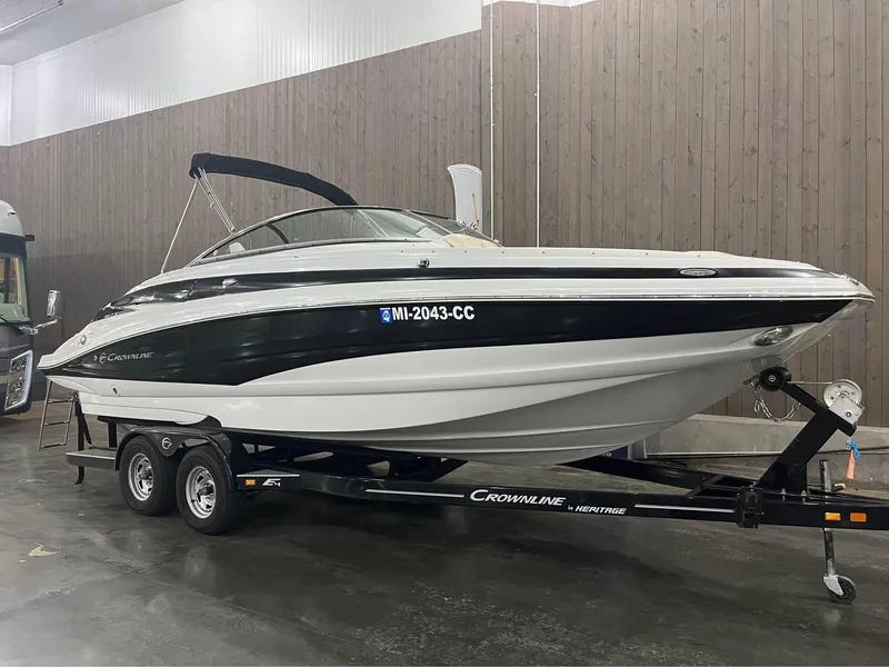The Image of 2016 Crownline E-4 Bowrider on trailer in indoor storage facility. - 0