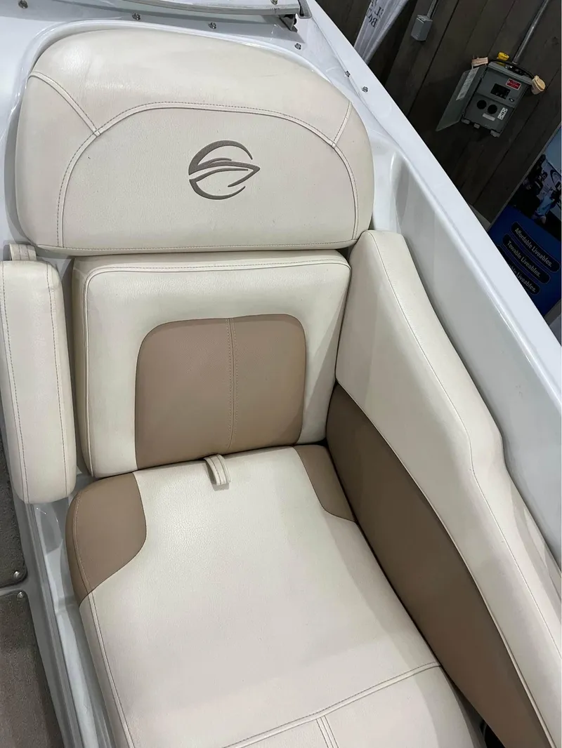 Slide: The Image of 2016 Crownline E-4 Bowrider seat with beige and cream upholstery. - 13
