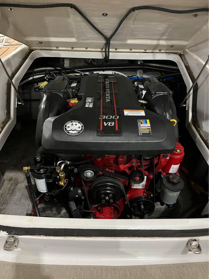 Slide: The Image of 2016 Crownline E-4 Bowrider engine compartment with Volvo Penta 300 V8 engine. - 15