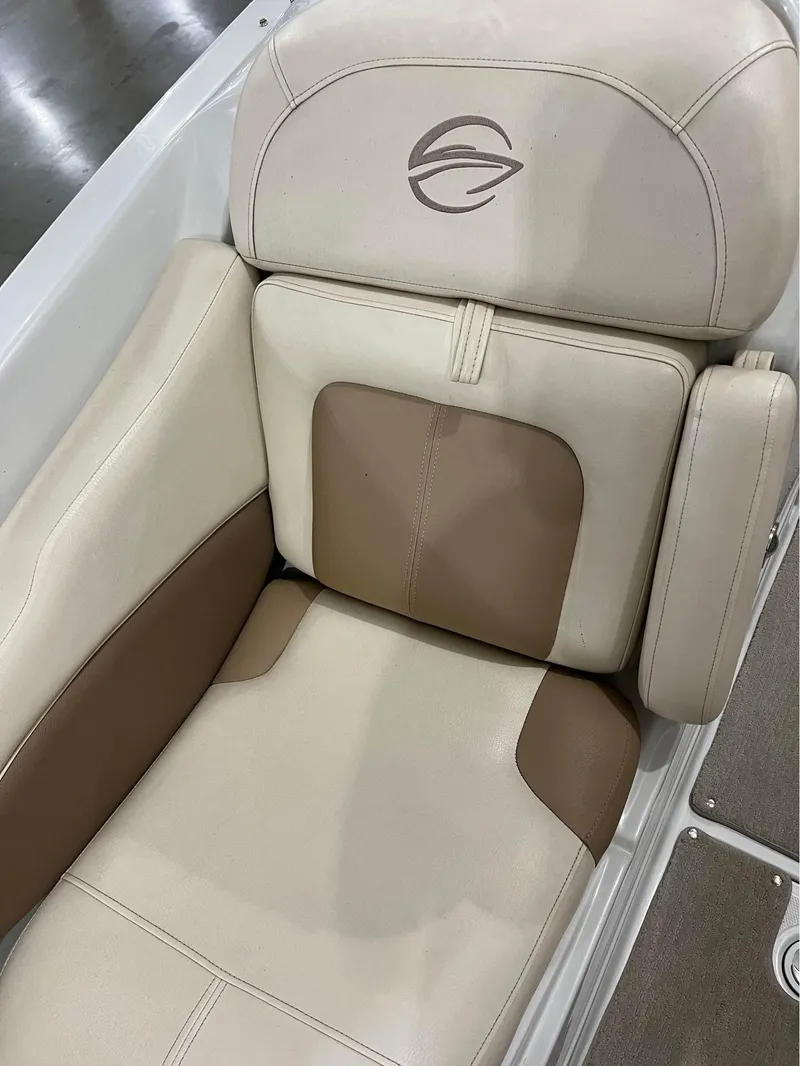 Slide: The Image of 2016 Crownline E-4 Bowrider seat with beige and brown upholstery. - 8
