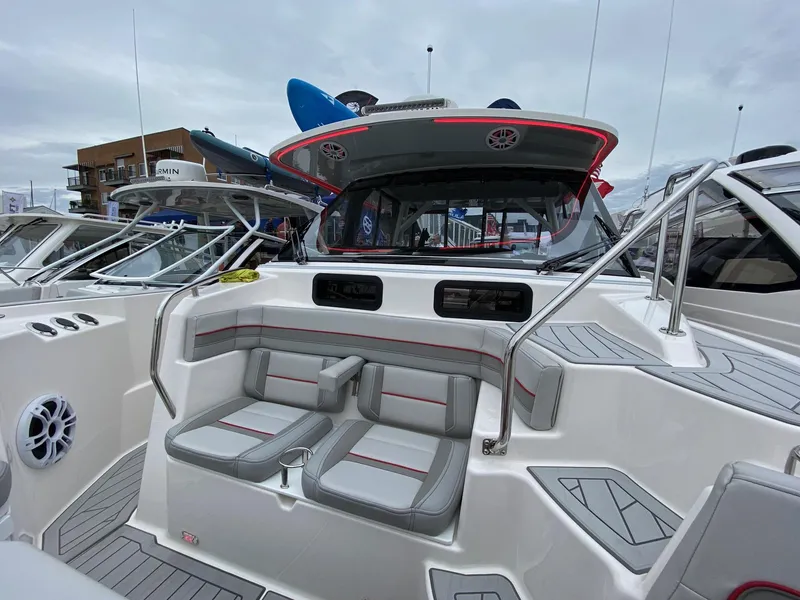 Slide: The Image of 2025 Solara S-310 CW boat interior with modern seating and sleek design. - 11