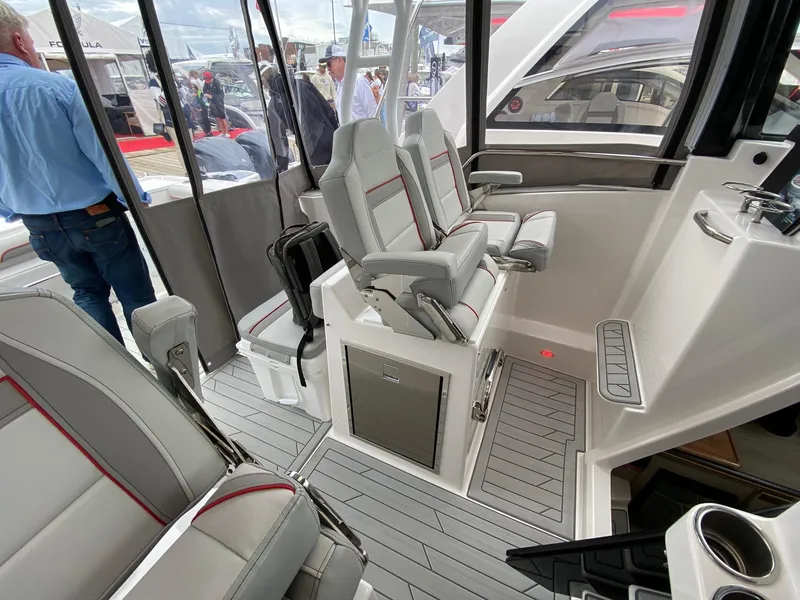 Slide: The Image of Interior of 2025 Solara S-310 CW boat with modern seating and sleek design. - 6