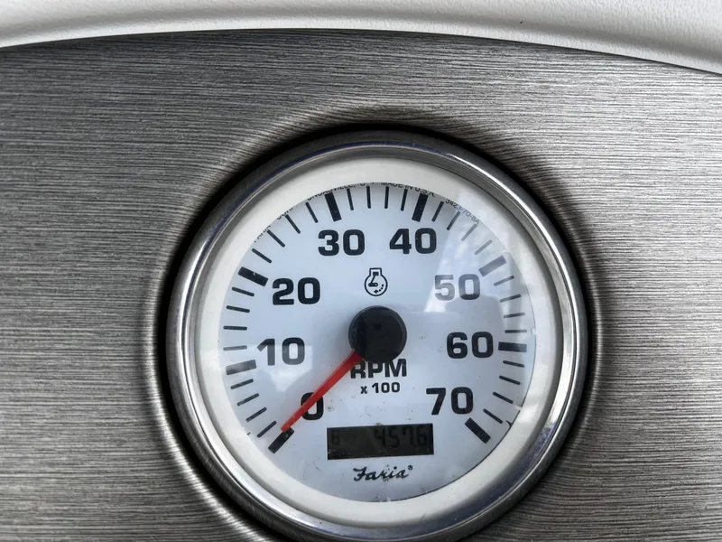 Slide: The Image of Close-up of a 2006 Crest II tachometer displaying RPM readings. - 10