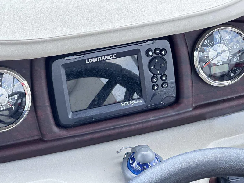Slide: The Image of Dashboard of 2023 Trifecta 22 CLE 275 with Lowrance Hook Reveal GPS. - 9