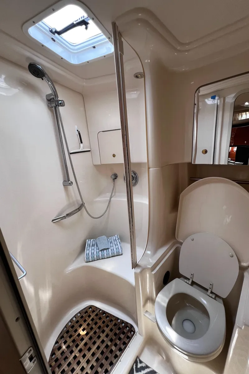 Slide: The Image of Bathroom interior of 2000 Sea Ray 380 Sundancer yacht with shower and toilet. - 34