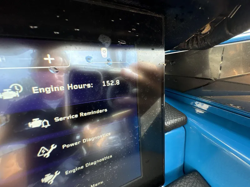 Slide: The Image of 2021 Nautique Super Air Nautique G23 Paragon display showing 152.8 engine hours. - 14